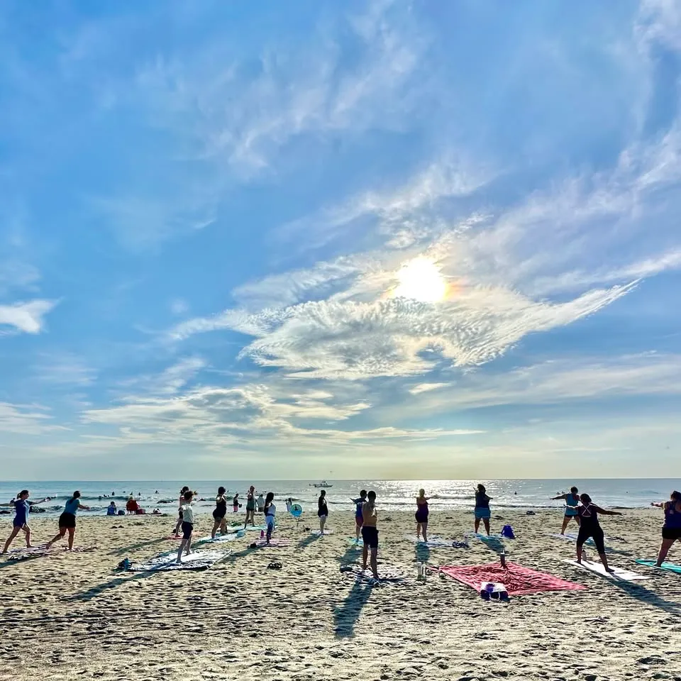 Community Yoga on the Beach Saturdays at North Beach