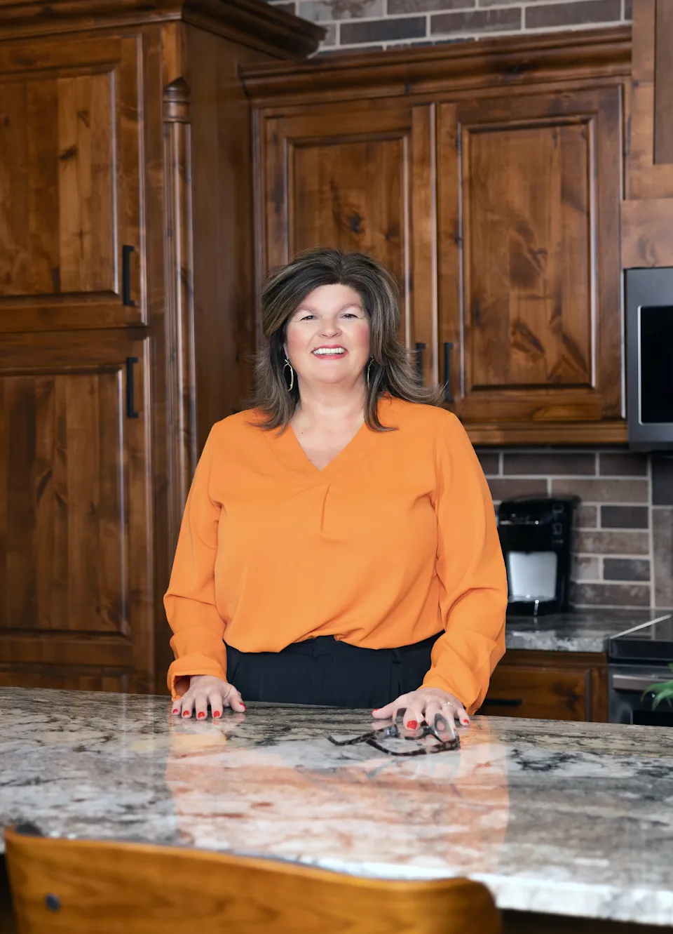 Click or Call Kelli Wall